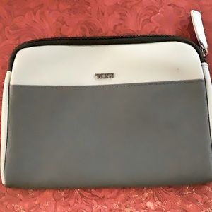 Tumi for Delta amenities case. With branded some amenities. Gray